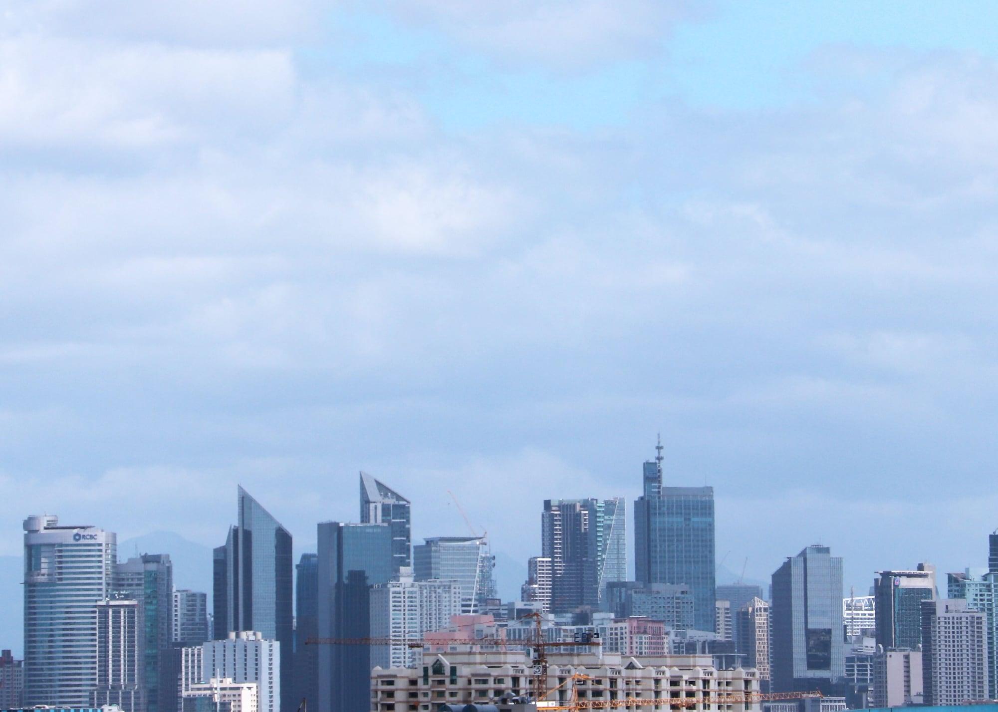Hotel Conrad Manila Pasay Exterior foto The skyline of Abu Dhabi
